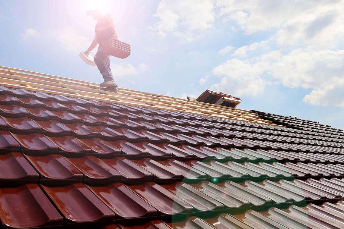 man doing roof work